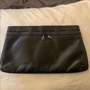 Black Etienne Aigner clutch.